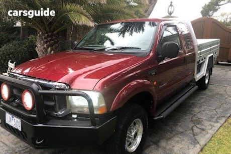 Red 2003 Ford F250 Super Cab Pickup XLT (4X4)