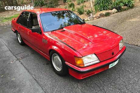 Red 1983 Holden Commodore Sedan