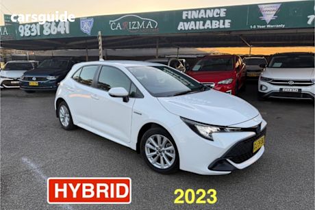 White 2023 Toyota Corolla Hatchback Ascent Sport Hybrid