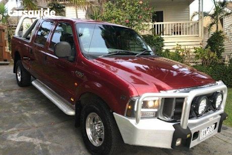 Red 2004 Ford F250 Crew Cab Pickup XLT