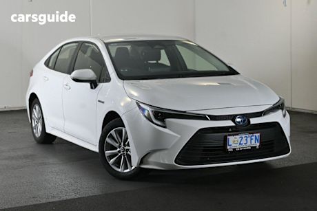 White 2023 Toyota Corolla Sedan Ascent Sport Hybrid