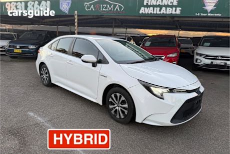 White 2020 Toyota Corolla Sedan Ascent Sport (hybrid)