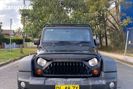 Black 2012 Jeep Wrangler Softtop Sport (4X4)