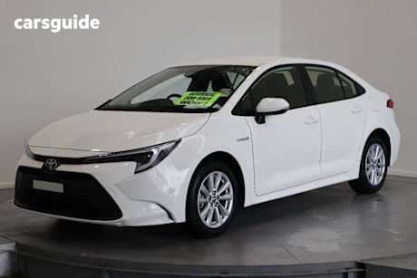 White 2023 Toyota Corolla Sedan Ascent Sport Hybrid