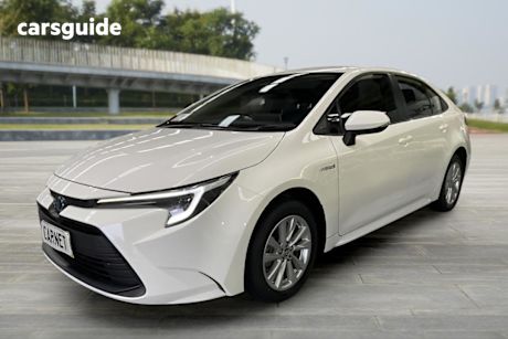 White 2023 Toyota Corolla Sedan Ascent Sport + Conv PK Hybrid