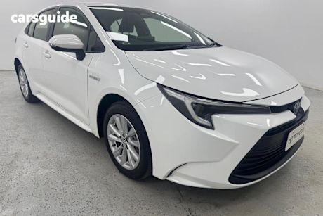 White 2023 Toyota Corolla Sedan Ascent Sport Hybrid