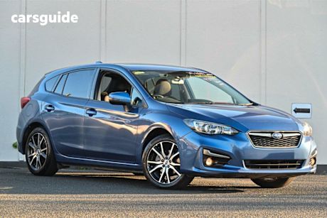 Blue 2017 Subaru Impreza Hatchback 2.0L (awd)