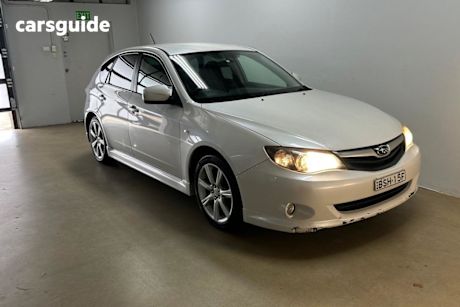 White 2010 Subaru Impreza Hatchback RS (awd)