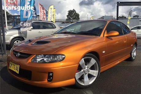 Orange 2005 Holden Monaro Coupe CV8