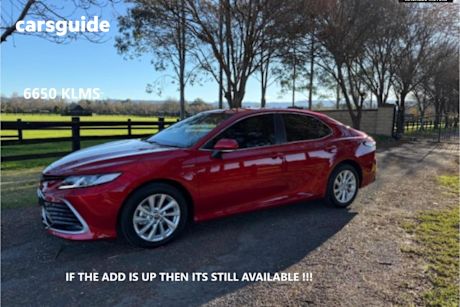 Red 2023 Toyota Camry Sedan Ascent Hybrid