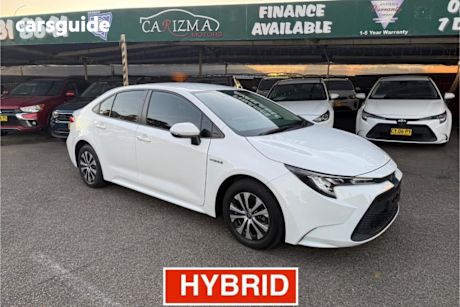 White 2020 Toyota Corolla Sedan Ascent Sport (hybrid)