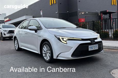 White 2023 Toyota Corolla Sedan Ascent Sport Hybrid