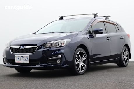 Blue 2017 Subaru Impreza Hatchback 2.0L (awd)