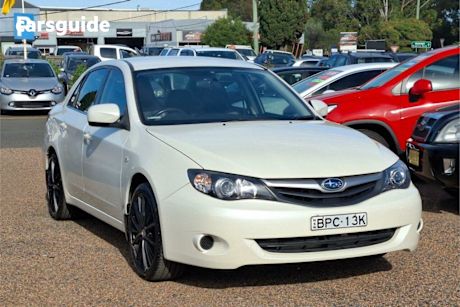 White 2010 Subaru Impreza Sedan R (awd)