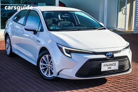 White 2023 Toyota Corolla Sedan Ascent Sport Hybrid