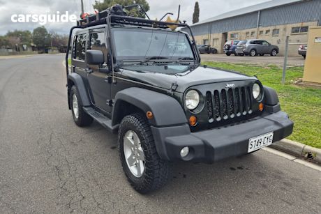 Green 2010 Jeep Wrangler Softtop Sport (4X4)