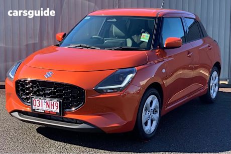 Orange 2024 Suzuki Swift Hatchback Hybrid Plus