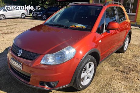Yellow 2007 Suzuki SX4 Hatchback 4X4