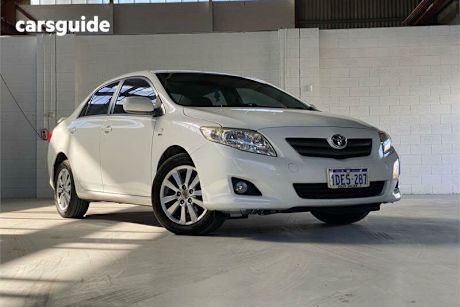 White 2009 Toyota Corolla Sedan Conquest