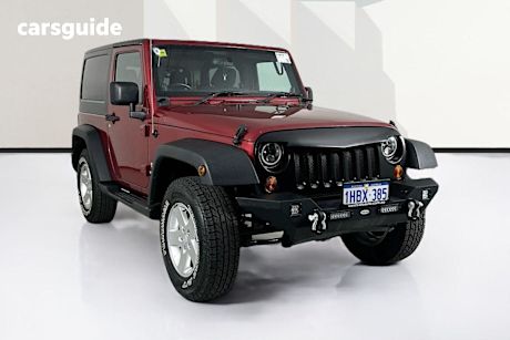 Red 2011 Jeep Wrangler Hardtop Renegade Sport (4X4)