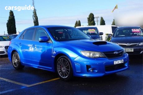 Blue 2011 Subaru Impreza Sedan WRX (awd)