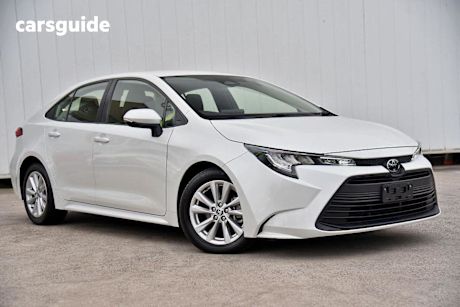 White 2023 Toyota Corolla Sedan ASCENT SPORT HYBRID F