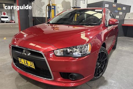 Red 2015 Mitsubishi Lancer Sedan ES Sport
