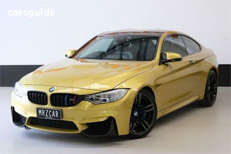 Yellow 2016 BMW M4 Coupe