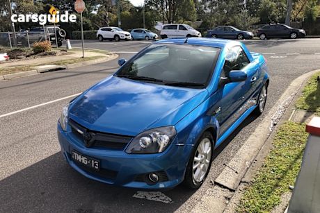 Blue 2005 Holden Tigra Coupe targa roof