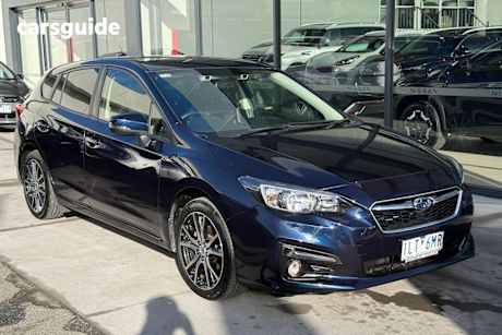 Blue 2017 Subaru Impreza Hatchback 2.0L (awd)