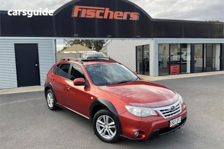 Red 2011 Subaru Impreza Hatchback XV (awd)