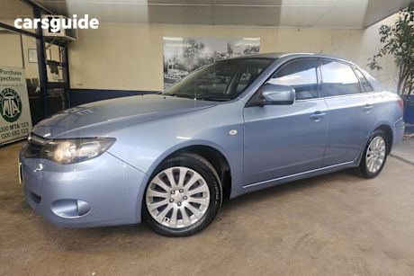 Blue 2011 Subaru Impreza Sedan R (awd)