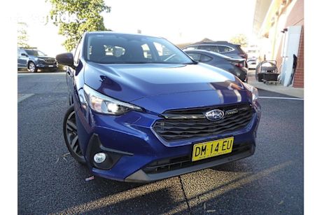 Blue 2024 Subaru Impreza Hatchback 2.0L (awd)