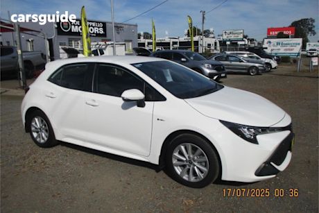 White 2024 Toyota Corolla Hatchback Ascent Sport Hybrid