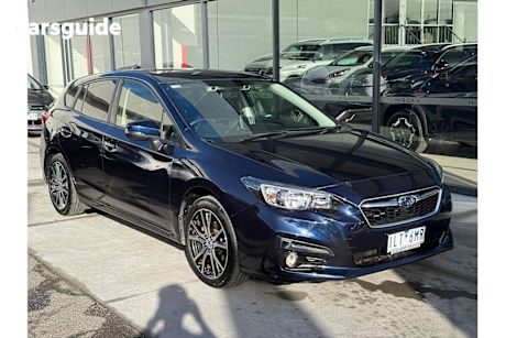 Blue 2017 Subaru Impreza Hatchback 2.0L (awd)