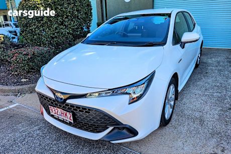 White 2023 Toyota Corolla Hatchback Ascent Sport Hybrid