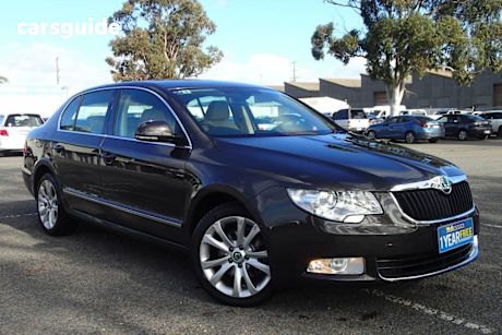 Brown 2011 Skoda Superb Sedan 125 TDI Elegance