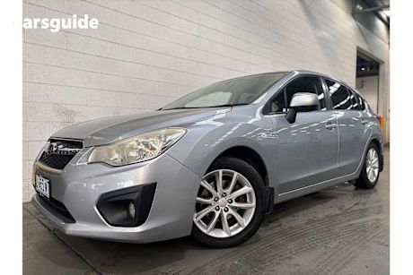 Silver 2012 Subaru Impreza Hatchback 2.0I-L (awd)
