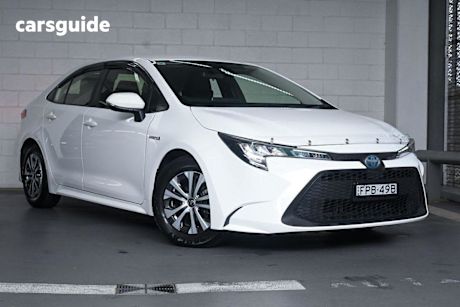 White 2021 Toyota Corolla Sedan Ascent Sport (hybrid)