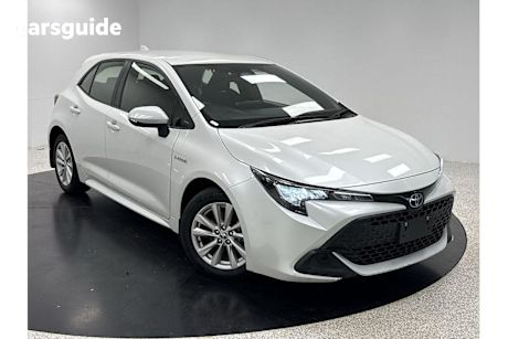 White 2023 Toyota Corolla Hatchback Ascent Sport Hybrid