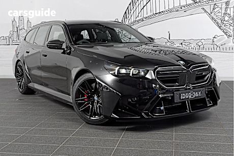 Black 2025 BMW M5 Wagon 4X4