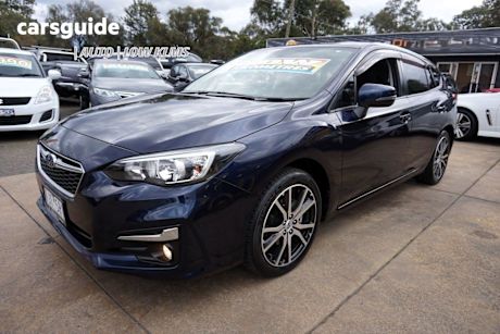 Blue 2017 Subaru Impreza Hatchback 2.0L (awd)