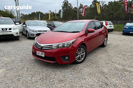 Red 2015 Toyota Corolla Sedan SX