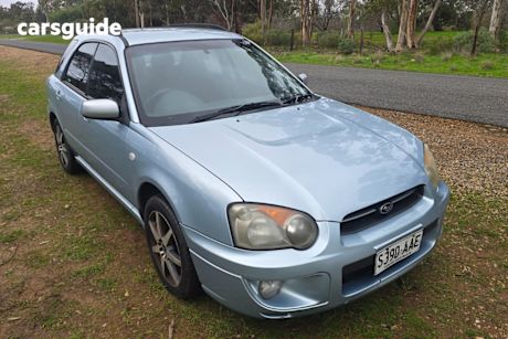 Blue 2005 Subaru Impreza Hatchback GX (awd)
