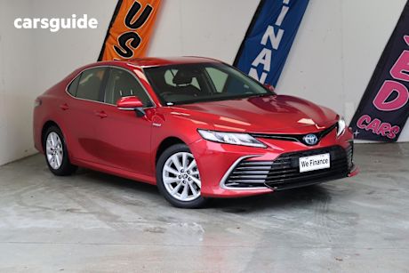 Red 2023 Toyota Camry Sedan Hybrid