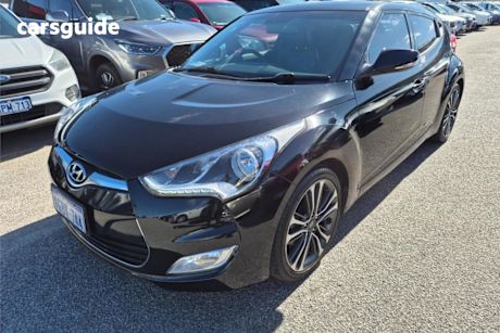 Black 2015 Hyundai Veloster Coupe +