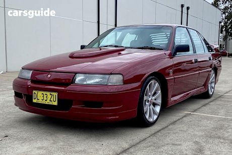 Red 1989 Holden Commodore Sedan
