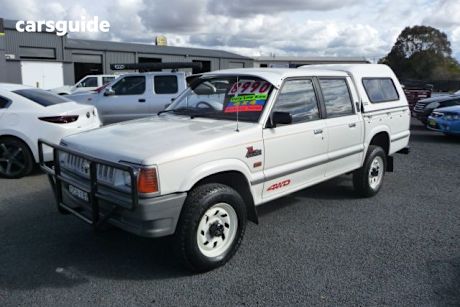 White 1995 Ford Courier Crew Cab Pickup XL (4X4)