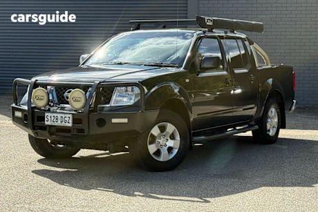 Black 2010 Nissan Navara Dual Cab Pick-up ST (4X4)