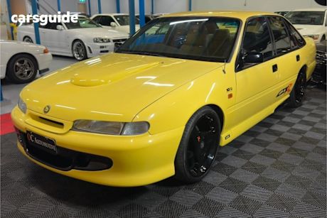 Yellow 1995 HSV Clubsport Sedan GTSR Replica